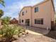 Spacious backyard featuring a concrete patio and beautiful landscaping for outdoor entertaining at 8348 Nelson Ridge Ln, Las Vegas, NV 89178