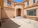 Elegant home entrance with circular drive and inviting front door at 8348 Nelson Ridge Ln, Las Vegas, NV 89178