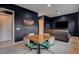 A cozy entertainment space with comfortable seating and a game table at 10172 Bismarck Palms Ave, Las Vegas, NV 89166