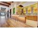 Charming juice bar with modern stools, colorful decor, and wood countertops for a refreshing experience at 10172 Bismarck Palms Ave, Las Vegas, NV 89166