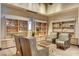 Cozy lounge area with comfortable seating, stylish shelving, and a relaxing ambiance at 10172 Bismarck Palms Ave, Las Vegas, NV 89166