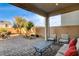 Covered patio featuring brick pavers and plenty of space for outdoor entertaining at 10172 Bismarck Palms Ave, Las Vegas, NV 89166
