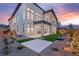 Spacious backyard features artificial turf, patio, and professional landscaping, perfect for outdoor entertaining at 10655 Patina Hills Ct, Las Vegas, NV 89135