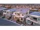 Contemporary two-story home with clean lines, modern architecture, and professional landscaping in a suburban setting at 10655 Patina Hills Ct, Las Vegas, NV 89135