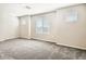 Expansive bedroom bathed in natural light from several windows, offering a serene and comfortable environment at 10748 Wild Poppy Ave, Las Vegas, NV 89129