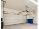 Clean and spacious garage with an automatic door, providing secure parking and storage space at 10748 Wild Poppy Ave, Las Vegas, NV 89129