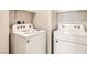 Convenient laundry area with a modern washing machine and dryer, ready for efficient laundry tasks at 10748 Wild Poppy Ave, Las Vegas, NV 89129
