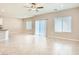 Spacious living room with tile flooring and natural light at 10748 Wild Poppy Ave, Las Vegas, NV 89129