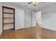 Bedroom boasts hardwood flooring, closet space, and neutral paint, offering a versatile living space at 1713 Diamond Oaks Ct, Las Vegas, NV 89117