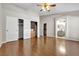 Main bedroom boasts hardwood flooring, vaulted ceiling, walk-in closet, and access to ensuite bathroom at 1713 Diamond Oaks Ct, Las Vegas, NV 89117