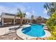 Sparkling blue pool nestled within a landscaped backyard; great for relaxation and entertainment at 1713 Diamond Oaks Ct, Las Vegas, NV 89117
