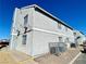 Multi-story apartments with stucco exterior and functional design, featuring multiple windows at 1912 Nebula Dr, Las Vegas, NV 89115
