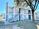 Charming two-story apartment building with a well-maintained exterior and inviting staircase entrance at 1912 Nebula Dr, Las Vegas, NV 89115
