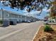 View of the exterior of the property with parking in front of the units at 1912 Nebula Dr, Las Vegas, NV 89115