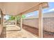 View of covered patio with support pillars and block wall providing privacy at 202 Twin Creek St, Henderson, NV 89074