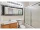 Bathroom with vanity, mirror and bathtub/shower at 202 Twin Creek St, Henderson, NV 89074