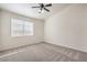 Spacious bedroom featuring a window and ceiling fan at 202 Twin Creek St, Henderson, NV 89074