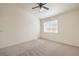 Bedroom with large window letting in natural light and ceiling fan at 202 Twin Creek St, Henderson, NV 89074