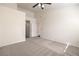 Main bedroom with a ceiling fan, neutral walls, and carpeted floors at 202 Twin Creek St, Henderson, NV 89074