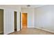 Bright bedroom with wood floors and closet with sliding doors at 2229 Suffron Hills Ct, Henderson, NV 89044