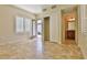 Empty bedroom featuring tile floors, natural light, and closet at 2229 Suffron Hills Ct, Henderson, NV 89044