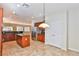 Spacious eat-in kitchen with stainless steel appliances, granite countertops, and a kitchen island for convenience at 2229 Suffron Hills Ct, Henderson, NV 89044
