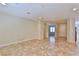 Spacious living room featuring tile floors and recessed lighting, creating a bright and inviting atmosphere at 2229 Suffron Hills Ct, Henderson, NV 89044