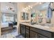 Bathroom vanity featuring double sinks, granite countertops, and attached bedroom at 2664 Ornate Regiment St, Henderson, NV 89044