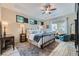 Comfortable bedroom with three window views and a plush rug at 2664 Ornate Regiment St, Henderson, NV 89044