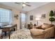 Bright office space with a cozy chaise lounge and large windows at 2664 Ornate Regiment St, Henderson, NV 89044