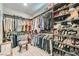 Spacious walk-in closet with custom shelving and organized storage at 2664 Ornate Regiment St, Henderson, NV 89044