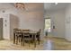 Bright dining room area with hardwood floors next to front entrance at 2739 Darby Falls Dr, Las Vegas, NV 89134