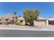 Charming home featuring desert landscaping with a mountain backdrop and two-car garage at 2739 Darby Falls Dr, Las Vegas, NV 89134