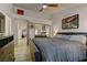 Comfortable main bedroom with ample closet space, ceiling fan and warm decor at 2739 Darby Falls Dr, Las Vegas, NV 89134