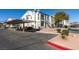 Condo building exterior with covered parking, well-maintained landscaping, and inviting curb appeal at 3318 N Decatur Blvd # 2138, Las Vegas, NV 89130