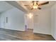 Open-concept living space with modern flooring, access to bathroom, and natural light at 3318 N Decatur Blvd # 2138, Las Vegas, NV 89130