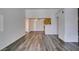 Inviting living room area with sleek flooring, fan, and hallway to the kitchen and bathroom at 3318 N Decatur Blvd # 2138, Las Vegas, NV 89130