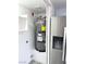 Laundry room features modern water heater at 3484 Nightflower Ln # 2, Las Vegas, NV 89121