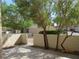 Cozy fenced patio featuring mature trees that offers shade and tranquility at 3484 Nightflower Ln # 2, Las Vegas, NV 89121