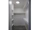 Walk-in closet featuring built-in shelving units, offering ample storage and organization space at 3484 Nightflower Ln # 2, Las Vegas, NV 89121