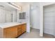 Bright bathroom with double vanity and a separate toilet room at 3517 Colby Creek Ave, North Las Vegas, NV 89081