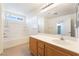 Well-lit bathroom featuring a vanity, and a shower-tub combo for convenience at 3517 Colby Creek Ave, North Las Vegas, NV 89081