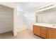 Bright bathroom with double vanity, tub and shower at 3517 Colby Creek Ave, North Las Vegas, NV 89081