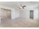 Spacious room with carpet and a ceiling fan. Plenty of space for customization at 3517 Colby Creek Ave, North Las Vegas, NV 89081