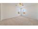 Bright and airy bedroom with two windows, providing ample natural light and a pleasant view at 3517 Colby Creek Ave, North Las Vegas, NV 89081