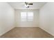 Empty bedroom with tiled floor and natural light at 3517 Colby Creek Ave, North Las Vegas, NV 89081