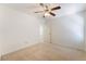 Comfortable bedroom featuring a ceiling fan and connecting door, offering a relaxing retreat at 3517 Colby Creek Ave, North Las Vegas, NV 89081