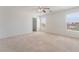 Spacious bedroom with carpet flooring, natural light, and a walk-in closet for ample storage at 3517 Colby Creek Ave, North Las Vegas, NV 89081