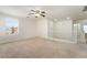 Bright upstairs bonus room featuring a ceiling fan and a window with neighborhood views at 3517 Colby Creek Ave, North Las Vegas, NV 89081