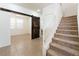 Inviting room featuring a barn door, ceiling fan and carpeted stairs at 3517 Colby Creek Ave, North Las Vegas, NV 89081